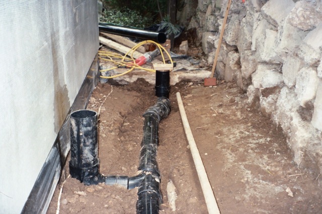 Foundation drainage down spout connection