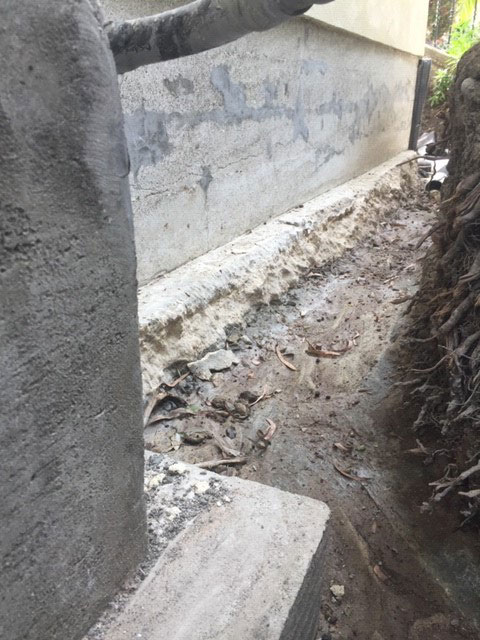Foundation footing profile requiring cement resurfacing