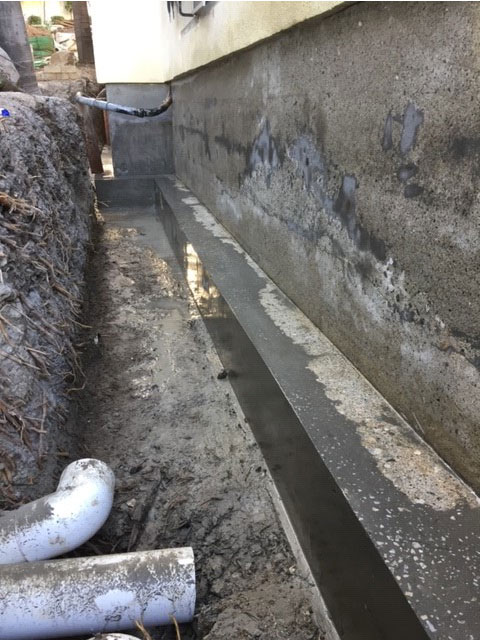 Foundation footing cement resurfacing complete”