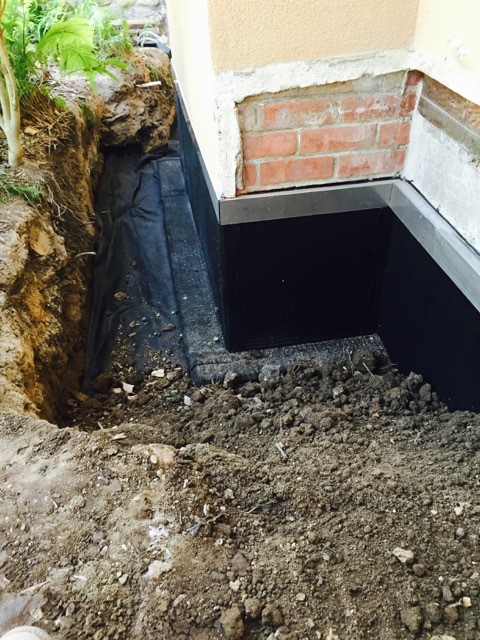 Foundation waterproofing applied after foundation repairs