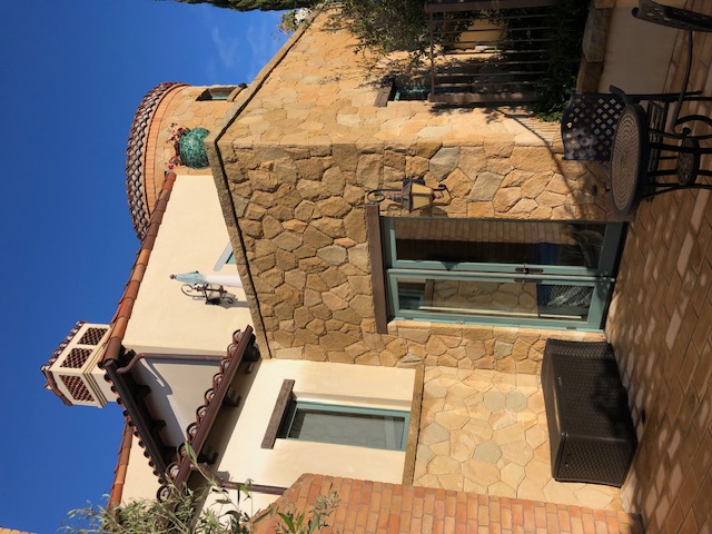 Tile deck leaks at patio door threshold creating interior water damage