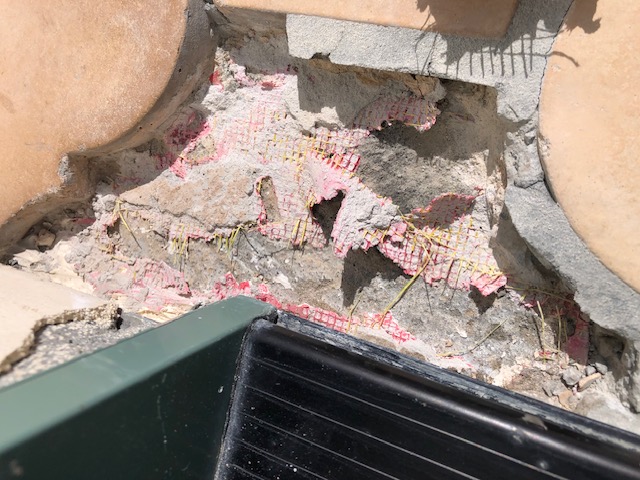 Deck tile removal to verify actual leak location