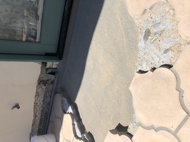 Waterproofing membrane applied over deck plywood substrate in existing delaminated areas