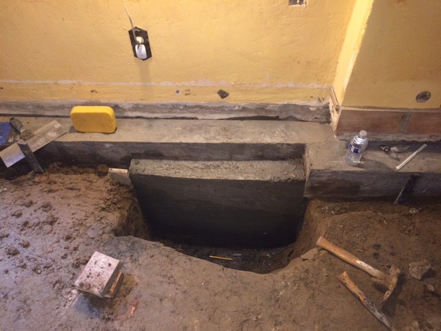 Basement footings restored for under slab waterproofing