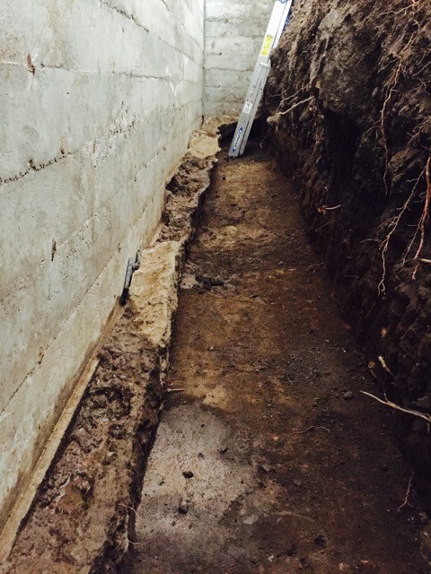 Foundation footing creating leaks in adjacent finished basement