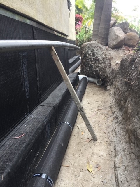 Foundation french drain installed at footing profile