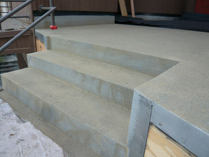 Application of vulkem 350 nf under tile waterproofing to deck step transition