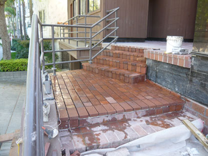Deck tile pavers installed over waterproofing anti-fracture membrane