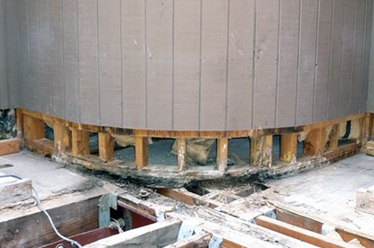 Courtyard deck radius wall sill plate termite damage