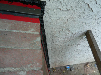 Installation of chimney, stucco wall transition counter flashing set in urethane sealant