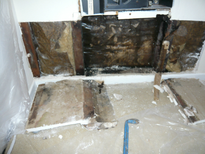 Section of drywall removed to identify source of water intrusion