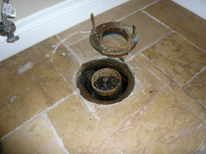 Leaking cast iron toilet flange