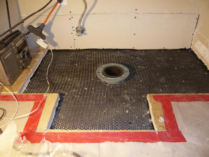 Cast iron toilet flange replacement at correct elevation