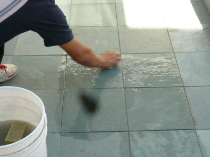 Surface preparation includes slate grout cleaning prior to applying stone sealer