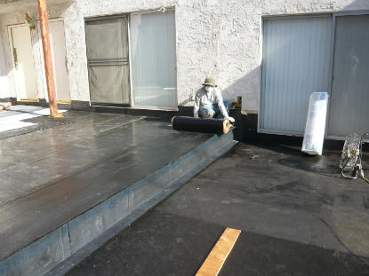 Application of waterproofing sheet membrane to deck change in elevation