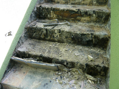 Defective under tile waterproofing creating leaks to slate stairway